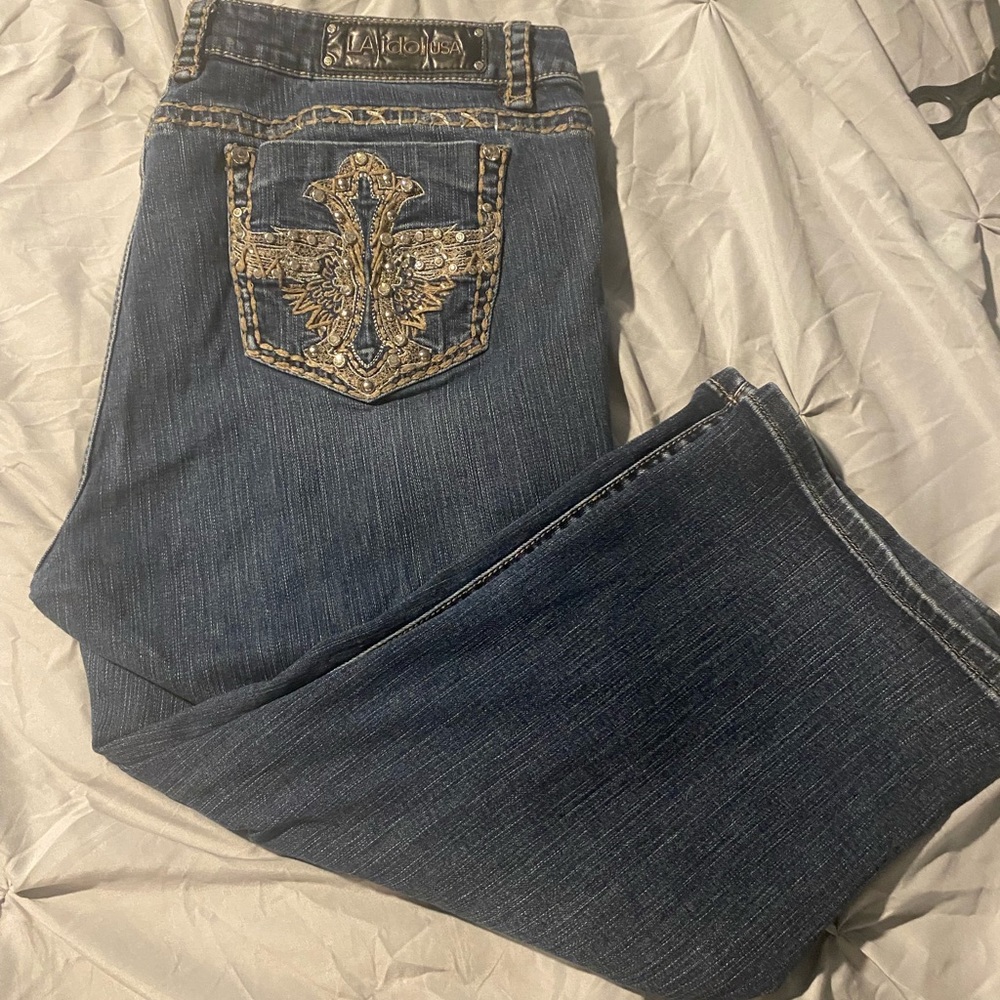 LA Idol distressed jeans with embellished back pockets
